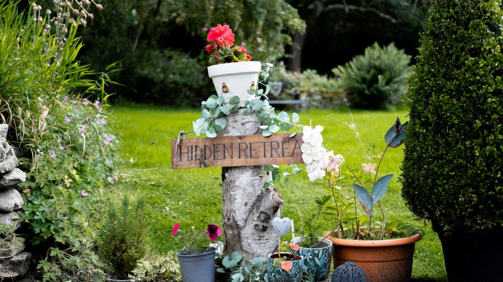 A wooden sign labeled 